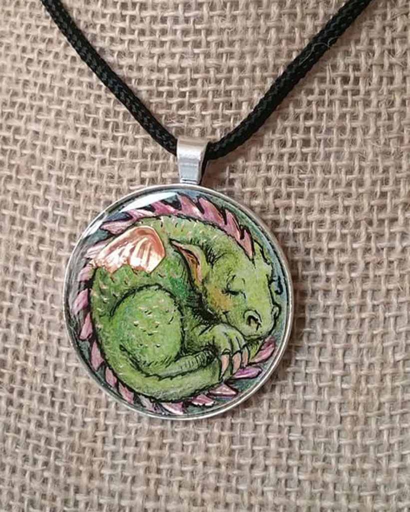 2" Colored pencil on copper - set in silver pendant bezel and sealed in resin. 
